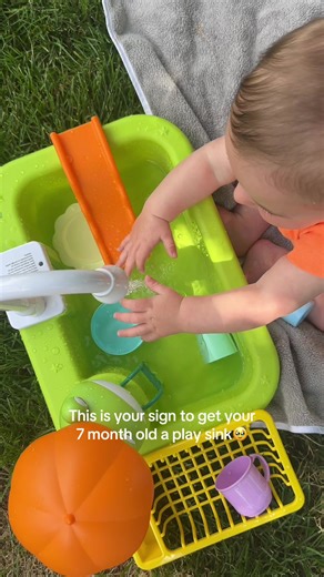 Engaging Play with Baby's Water Faucet