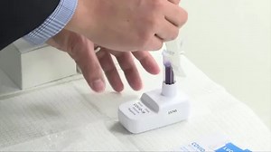 A swab, a swirl, 30 mins: the at-home COVID-19 test