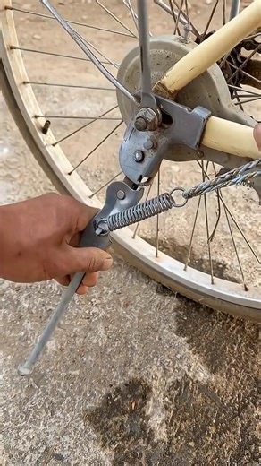 Install Bike Kickstand Spring with a Rope.