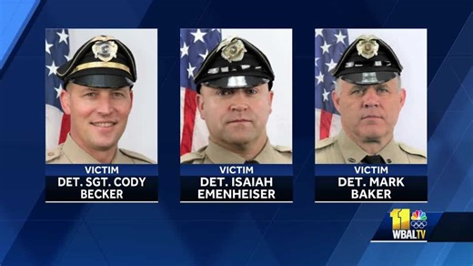 Community mourns after police officers killed in ambush shooting