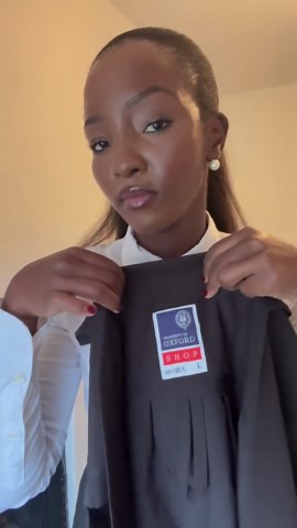 Terembe on Instagram: "Graduation ready 👩🏾‍🎓 Wearing ‘sub-fusc’ which is Oxford’s traditional attire for formal events like matriculation, exams and graduation. There are slight variations of sub-fusc so you can choose how to wear yours. I wore a black pleated skirt (from @nextofficial), white cotton shirt (from @hm), tights, a black ribbon, gown and my monolith loafers. I love this ‘fit and sad that this is one of the last times I’ll wear it. I’ll miss this season of my life, dearly #MBAtere