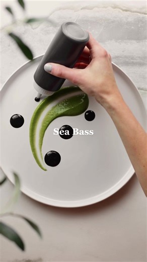 Delicious Sea Bass with Pea Purée and Squid Ink Aioli Recipe