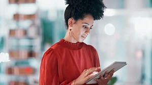 Tablet, office and face of black woman mindset for online market research, data analysis and application. Businesswoman, entrepreneur or happy professional person with digital technology for startup