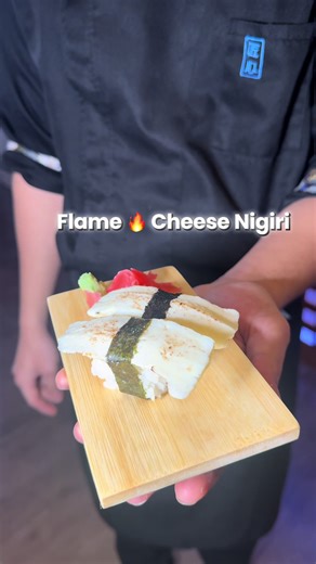 Tell us what you think of #cheese and #rice together? It’s surprising super delicious this is 🔥 flamed #cheese #nigiri at Osaka Belfast #japaneserestaurant tell us what you think