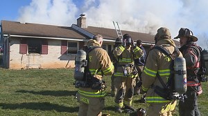 Firefighters learn to battle a house fire by starting a house fire
