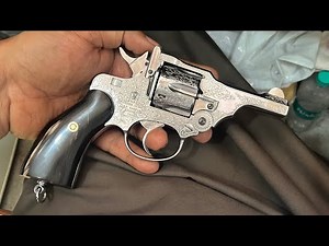 Iof .32 bore revolver mk1 full engraving and custom grips.