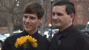 Same sex couple marries in front of courthouse