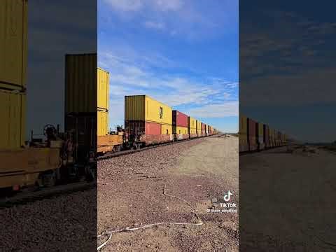 Bnsf 3677 bnsf 7422 and bnsf 4025 are 3 locomotives that are carrying containers