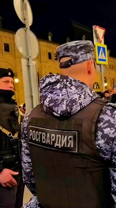 22K views · 1.2K reactions | A young, handsome Russian National Guard soldier stands on duty shyly as a group of girls chat and giggle nearby — strength in uniform, but bashful at heart.  #RussianArmy #Russia | Russia Unofficial | Facebook