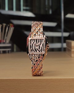 A tour de force of savoir-faire, this new interpretation of the Panthère de Cartier watch demanded precise craftsmanship from the ateliers. The lacquer work is applied by hand and fired at high temperatures within the Maison des Métiers d'Art, the snow setting of the dial is adorned with 145 brilliant-cut diamonds, and the bracelet is entirely paved with 314 brilliant-cut diamonds and 86 spessartites, each link polished and set one by one. This is a jewel of a watch that took over 110 hours to m