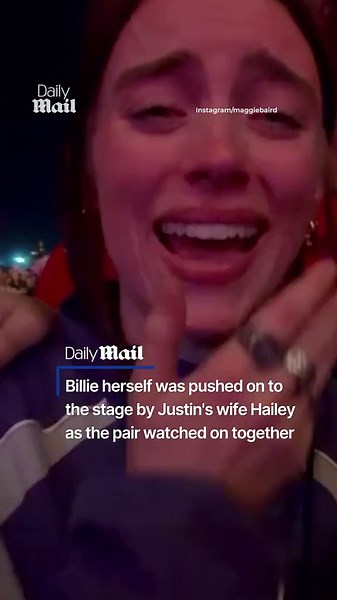Billie Eilish wears black Celine suit at premiere of her concert movie
