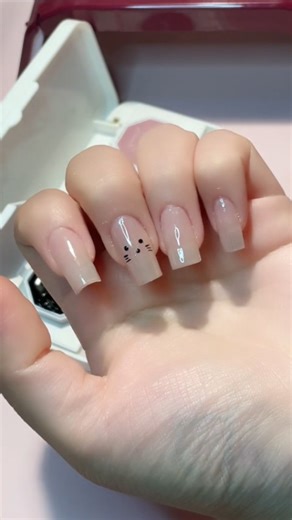 How To: Simple Cute Animal Face 🐰 Tools used: - Gel Shades: Fawn, Onyx 🤎🖤 - Base & Top Coat 🛡 - Dotting Tool 🖌 - Precision 2-in-1 Brush 🖌 - Nail Lamp 💡 Steps: 1. Apply and cure Ambedo Base Coat for a smooth base 2. Use Ambedo 2-in-1 brush (the normal application side) to apply shade FAWN onto your nails as the base colour. Then cure under your nail lamp. 3. Use Ambedo Dotting Tool and apply shade ONYX in a light Dotting motion Create 3 dots for the eyes and nose. Once you're happy with th