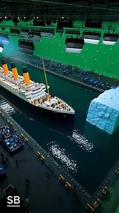 Titanic BTS: Full-Scale Ship Crash Filmed by Overhead Drone — Insane Behind-the-Scenes! Go behind the scenes of one of the most ambitious shots ever created for Titanic — the full-scale ship crash captured from an overhead drone. This rare BTS footage reveals how the production team built a gigantic section of the Titanic on hydraulic platforms inside an open-air water tank. Massive flood rigs, wave machines, and smoke cannons were synchronized to recreate the chaos of the real 1912 impact. The 