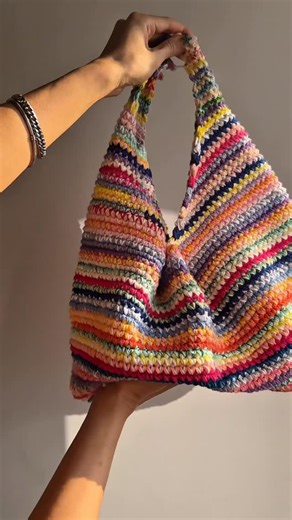 bygalk 🍉 on Instagram: "How adorable is this scrap yarn crochet bag! New details tutorial for this bag is out now! The dumpling bag pattern is a beginner-friendly crochet pattern with step by step instructions & a full detailed video tutorial! Learn how to crochet your very own💖 #crochet #crochetbag #crochettutorial #crochetinspiration #crochetinspo"
