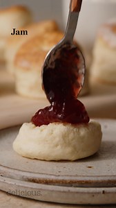 This timeless scone recipe from the Country Women's Association delivers light, fluffy perfection every time, made with just a handful of simple ingredients like self‑raising flour, cream, and milk. Serve them warm with your favourite jam and whipped or clotted cream for the ultimate teatime treat. Get the recipe here: bit.ly/3SoX0xG | delicious. Australia