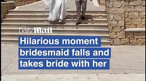 Bridesmaid takes tumble and drags bride with her