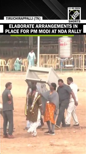 Hoardings of PM Modi line the roads ahead of his appearance at the NDA public rally