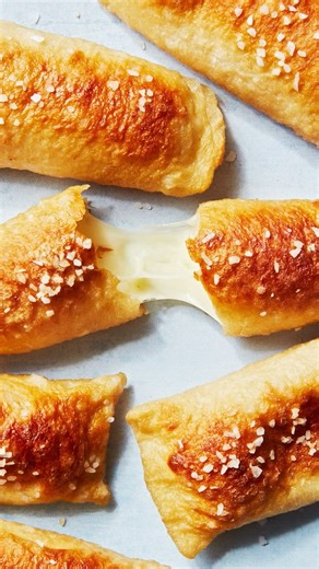 87K views · 126 reactions | These Mozzarella-Stuffed Pretzels are the perfect after-school, gameday, or party snack 泌 The best part is that they're made with just three ingredients: store-bought pizza dough, mozzarella cheese sticks, and flaky salt. Full recipe in bio. #recipe #snackrecipe #appetizers #easyrecipe #gamedayrecipe #gameday #snacks #cheese #pretzel | Delish | Facebook