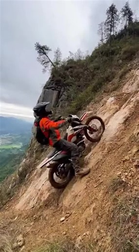 Extreme Motorcycle Riding on the Edge of a Cliff