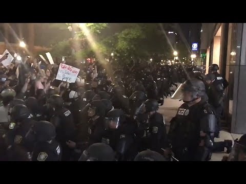 'Kneel with us!' Police officers kneel with protesters in Lexington, KY