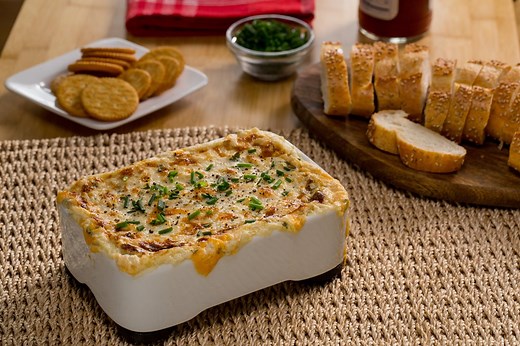 7.9K views · 48 reactions | The dip is filled with ooey-gooey cheesy goodness and delicious crab. Serve with bread or eat it with spoon, your call. Full recipe: https://aol.it/2XMoU94 | Yahoo | Facebook