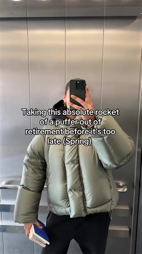 Forest Green Puffer Jacket Takes Center Stage