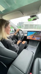 Auto World on Instagram: "Playing videogames in Tesla 😱😍 Do you like? Video: @jessicarmaniac #tesla #teslamodel3 #model3performance #teslamodel3performance #jessicarmaniac #gaming #gamer #cars"