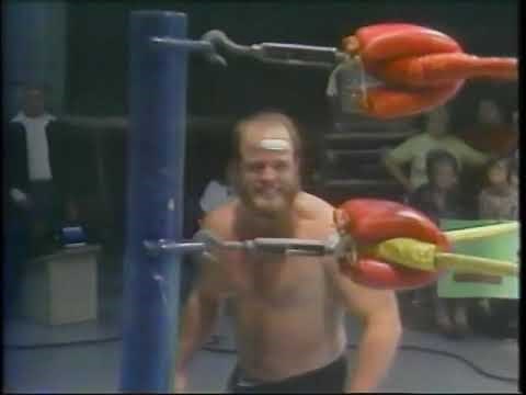 Buzz Sawyer acting more insane than usual. WCW, September 1982.