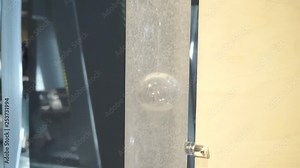 Two bubbles connecting to and exploding at the end.