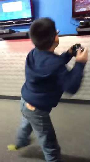 Kid doing the pee pee dance in public got to watch