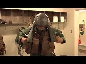 Pilots Don MOPP Protective Gear - 25th Fighter Squadron