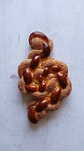 Imagine a challah THIS beautiful on your family's table ✨ (Pro tip from Challah Prince: Dip strands of dough in lukewarm water then roll in seeds before braiding!) We love to see it, Challah Prince! | Food Network