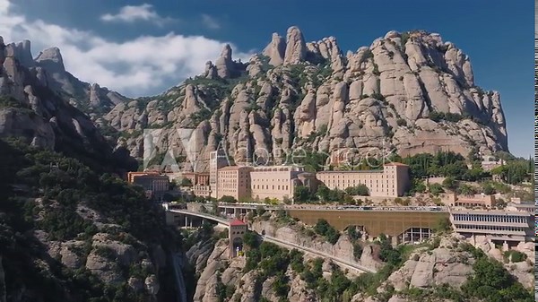 Aerial view of the Benedict church Abbey of Monserrat from Barcelona, Spain. Montserrat Monastery, Santa Maria de Montserrat is a Benedictine abbey located on the mountain of Montserrat