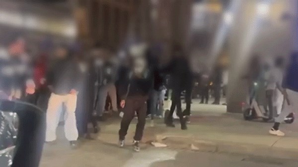 Rowdy crowds of teens flood downtown Detroit during a chaotic 'takeover'
