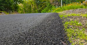 Add color with a chip seal driveway