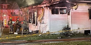 Officials investigating Lansing house fire after reported explosion