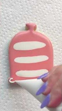 Cookie artist is decorating Tea Party cookies!