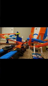 Hot Wheels cars racing on 3 track sets connected together #challengeaccepted #hotwheels