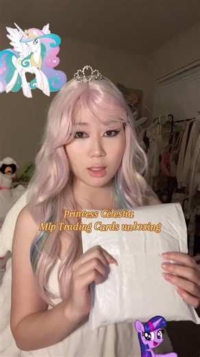 Mel❦vy🪽 on Instagram: "Celestia opening mip trading cards!! Need to get more from Twilight~ the cutest cards ever !! I would get more excited but I think im in celestia cosplay so im trying to be nonchalant ~ thank you @kayouus ∴∵∴ ୨୧ ∴∵∴ ୨୧ ∴∵∴ ୨୧ ∴∵∴ ୨୧ ∴∵∴ ୨୧ ∴∵∴ #mlp #celestia #mylittlepony #kayou #tcg #tradingcard #collection #unboxing #blindbags #trinkets #cosplay #costume"