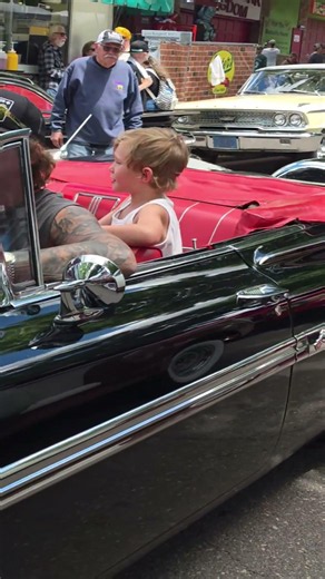 1959 Impala convertible family enjoying the 52nd annual MSRA Back to the 50s weekend car show