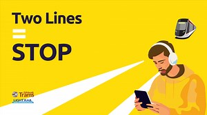 Don’t get distracted when you cross our tracks. Remember, Two Lines = STOP. Find out more ways to be safe around our trams here ➡️ https://bit.ly/4dhUC5g | Edinburgh Trams