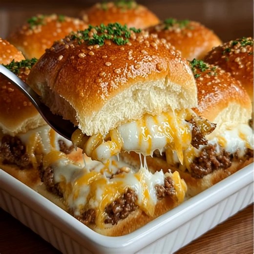 Cheesy Baked Beef Sliders These warm, cheesy sliders deliver that familiar, comforting flavor of a baked party sandwich — easy to prepare and ideal for a simple family dinner or sharing with friends. Ingredients For the Beef Filling 1 lb ground beef 1 small onion, finely chopped 2 cloves garlic, minced 1 tablespoon olive oil 1 teaspoon Worcestershire sauce 1/2 teaspoon salt | The Cozy Spoon