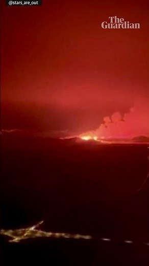 Eruption of Iceland volcano seen from plane window