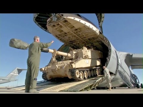 Huge US Transport Aircraft C-5 Galaxy Swallowing M109A6 Howitzer