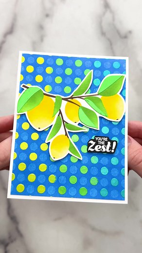 I am obsessed with making DIY greeting cards using Neon Lunar Pastes!✨ Here, I ink blended my background using Simon Hurley ink in the color No Diving. This gives it a beautiful blue hue! Then, I sprayed water through the Polka Dot Assortment stencil which lifts off color in that design.🙌🏻 Then, I shifted the stencil and applied Neon Lunar Paste in the colors Voltage, Dart Frog, and No Chill. Swiping them smooth across the card using the Paste Tools Set. I love these bright neon colors against
