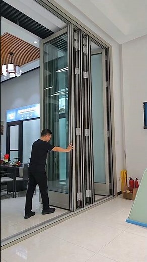 heavy-duty folding door features a maximum height of 6 meters with ultra-smooth sliding operation