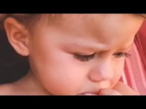 Sweet, tender-hearted baby girl cries when mommy sings