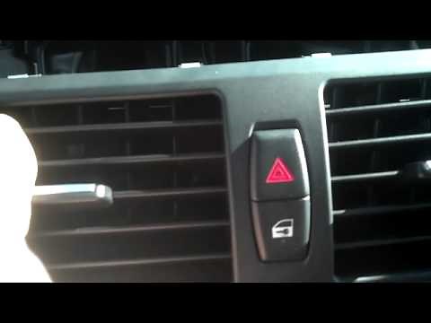 Removing the display screen and central locking BMW X5 E70