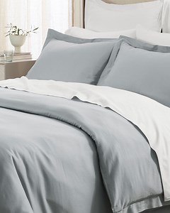 Effortlessly put together the duvet set of your dreams in 5 simple steps: Step 1. Lay the duvet insert flat on the bed with the duvet cover gathered at the top. Step 2. Attach the coordinating top corner ties and loops. Step 3. Slip the cover toward the bottom of the insert. Step 4. Attach the coordinating bottom corner ties and loops. Step 5. Secure, fluff and enjoy. #bollandbranch https://bit.ly/30yrAgB Music: Bensound | Boll & Branch