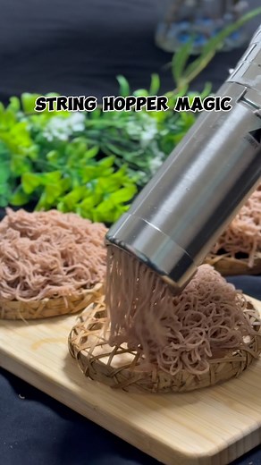 Rifka Imam on Instagram: "Everyone’s been asking how I made string hoppers using this amazing machine,here’s the magic in action 😍 Captured the beauty of string hopper making from two stunning angles - a top-down view and a close-up of the delicate strands falling like soft snow. Thank you to @summer_snooow for sending me this beauty of a kitchen companion .their electric string hopper maker is a total game changer! It was so satisfying to watch the strands fall that I just kept going… u